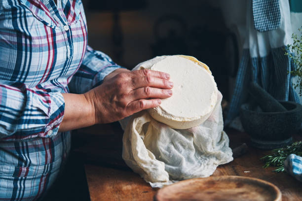 istock Making Fresh White Cheese in Domestic Kitchen 2160485774