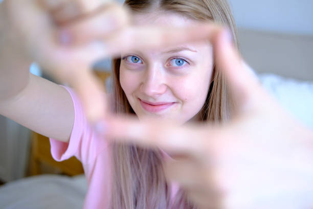istock Cute girl 15-18 years old makes a selfie 2160490190