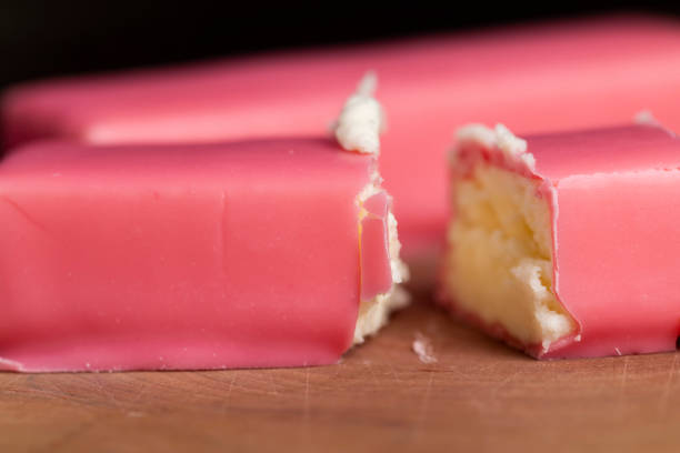 Studio shot of twisted doughnuts known in the UK as Yum Yum cut out against a white background
