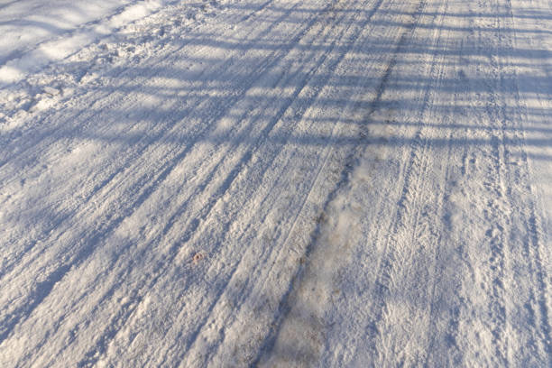 istock a road covered with snow that is dangerous for motor vehicles 2160491624