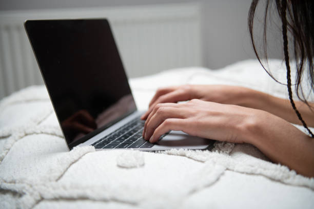 Closeup, freelancer or technology with blog writing, remote work and copy writing in home