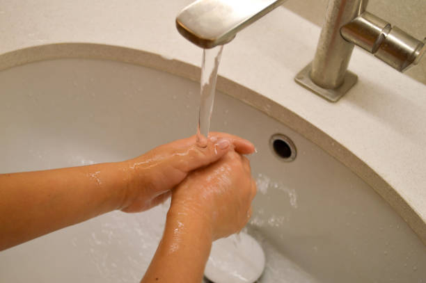 istock Washing Hands with Soap Under Tap, children hygiene. 2160492307