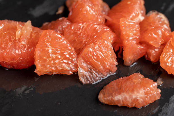 istock slices of peeled grapefruit close-up 2160493875