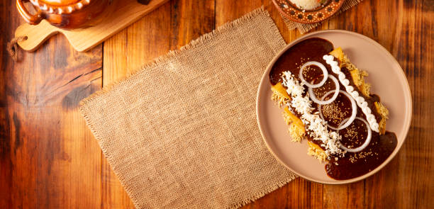 istock Enmoladas Mexican food background panoramic 2160496591