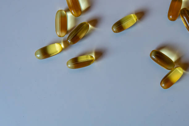istock Extreme close up of cod liver oil capsules 2160497235