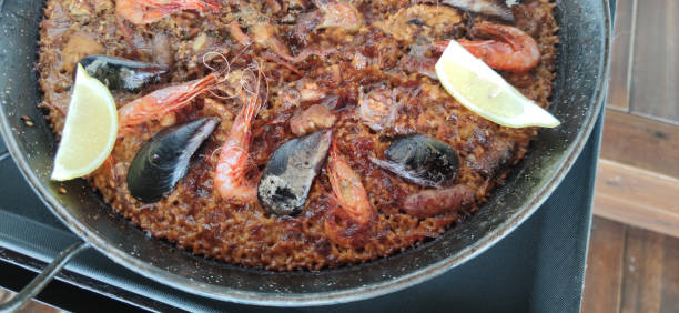 istock typical spanish paella rice with seafood 2160500712