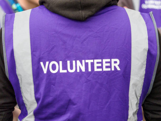 istock Man wearing vest that says 