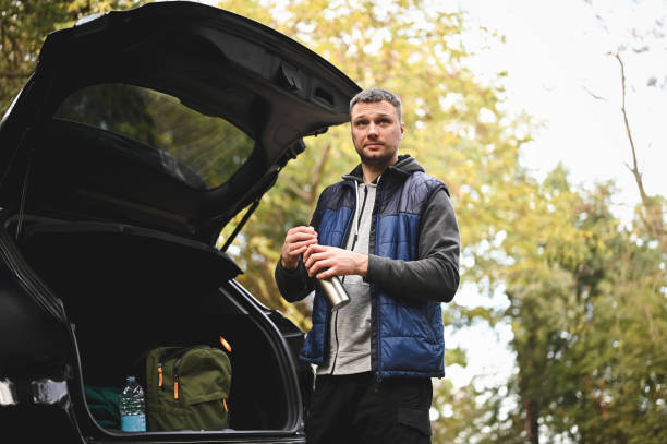 istock Young man preparing for hiking. 2160501107