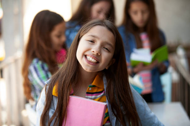 istock Happy girl with books having fun, back to school 2160502914