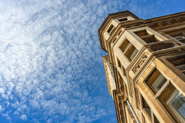 Old English building against blue sky