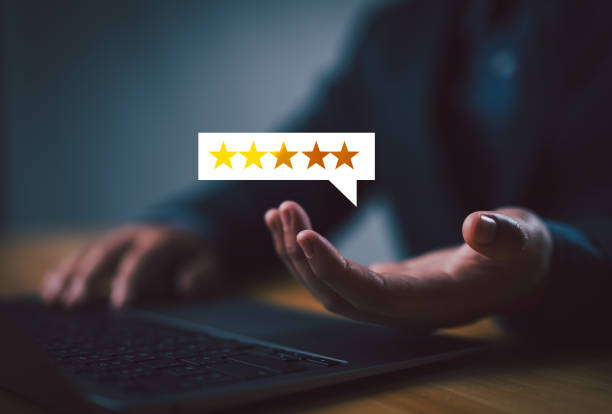 istock Businessman or customer showing popup five-star icon for feedback review satisfaction service, Customer service experience and business satisfaction survey. Quality control, best, good. 2160506749