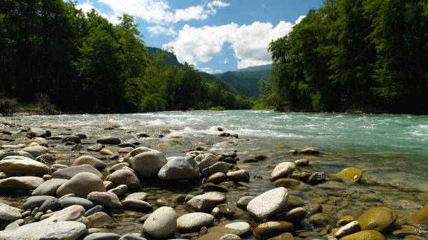 istock A clear, rushing mountain river flowing down a rocky course 2160510824