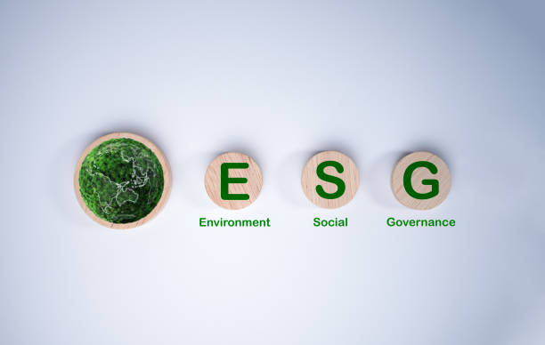 istock A circular wooden board with the abbreviation ESG printed on a light white background, ESG concepts for sustainable environment, society and governance Businesses are environmentally responsible. 2160512702