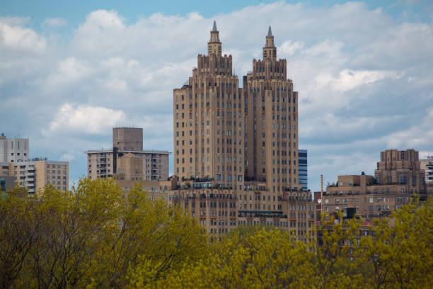 The twin towers of the iconic San Remo building and the trees of Central Park, Manhattan Island, New York City