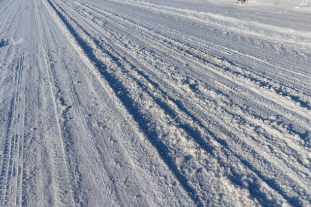 istock a road covered with snow that is dangerous for motor vehicles 2160514286