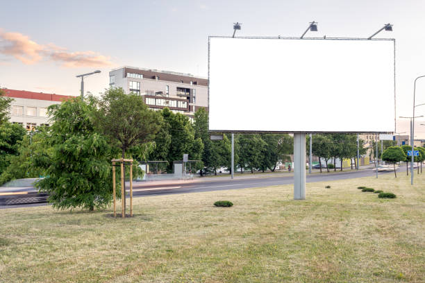 istock Big Empty Billboard Mockup Along A Highway On The City Background 2160518912
