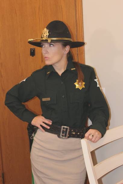istock uniformed, female police officer 2160519972