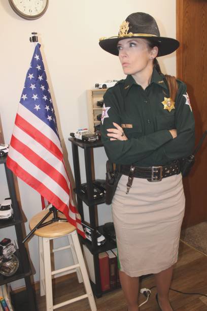 istock uniformed, female police officer 2160519977
