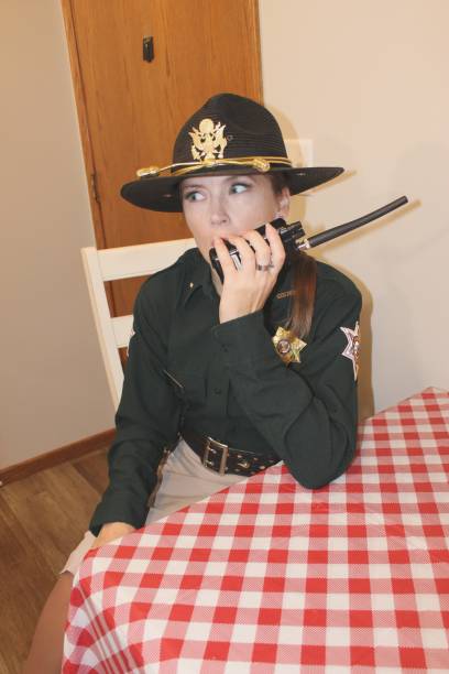 istock uniformed, female police officer 2160519978