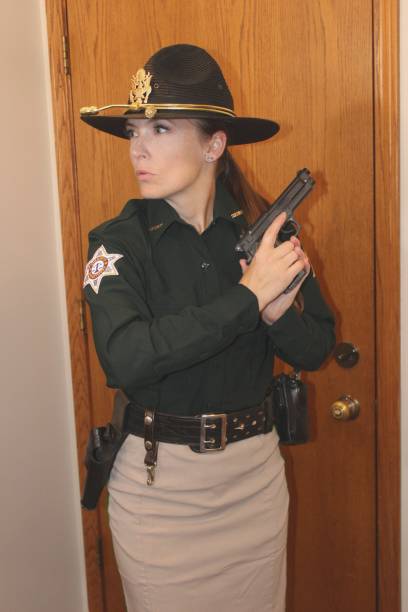 istock uniformed, female police officer 2160519994