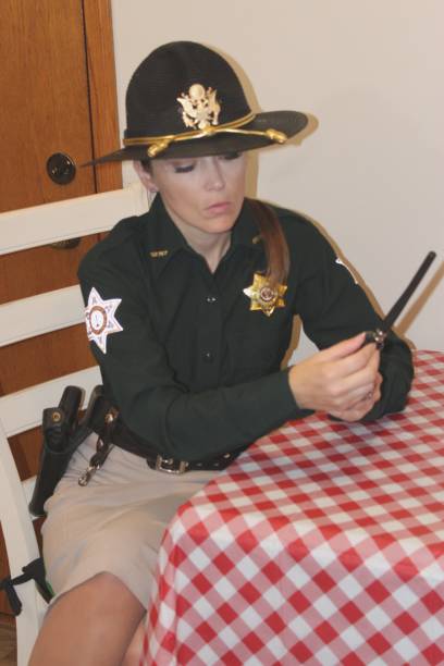 istock uniformed, female police officer 2160519998
