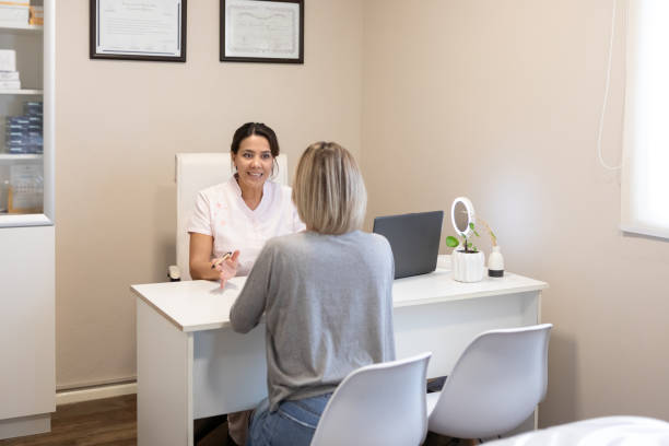 istock Dermatologist in consultation with female patient 2160522334