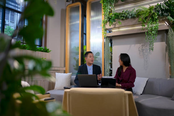istock White collar workers are working at sustainable office. 2160524881