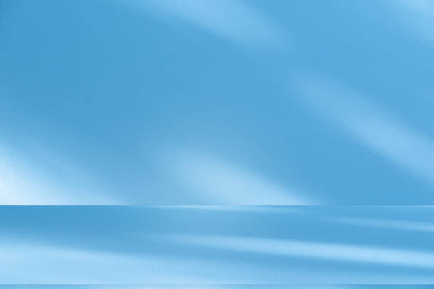 istock Wall interior background, studio, and backdrops show products. with shadow from window color white and blue light. background for text insertion and presentation of product 2160526067