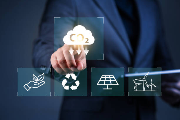 istock Reduce co2 emission. man using software to lower CO2 emissions to limit global warming and climate change, 2160526992