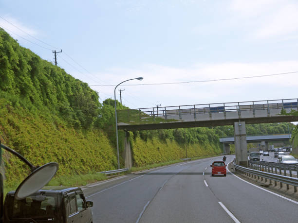 istock Highway noise barriers Overgrown with green vegetation 2160531494