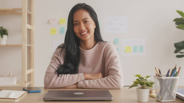 istock Young Asian woman Looking at camera. 2160531778