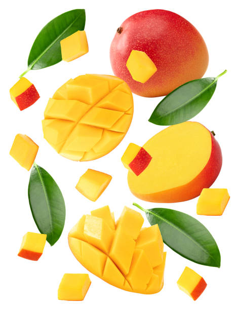 istock flying mango with slices and green leaves isolated on white background. clipping path 2160533934