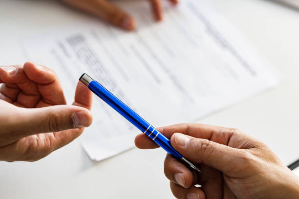 istock Here's a pen for contract signing! 2160534107