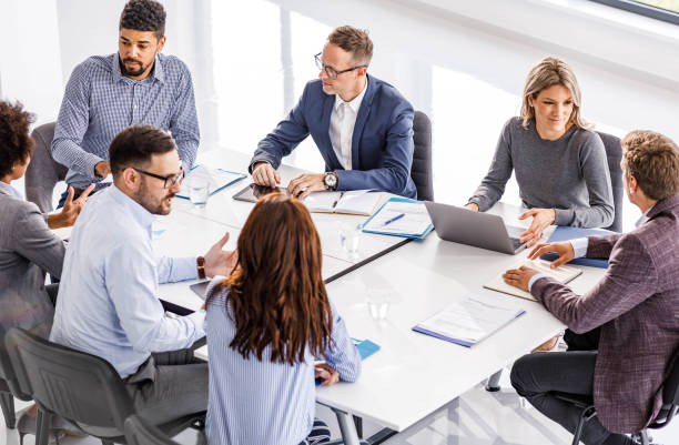 istock Business team talking on a meeting in board room. 2160534488