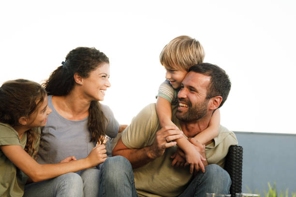 istock Cheerful family having fun on a patio. 2160535067