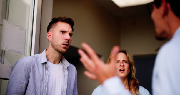 istock Angry dispute interrupts young woman's peaceful visit 2160535118