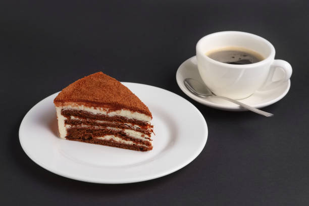 istock Chocolate biscuit cake and cup of coffee 2160536086