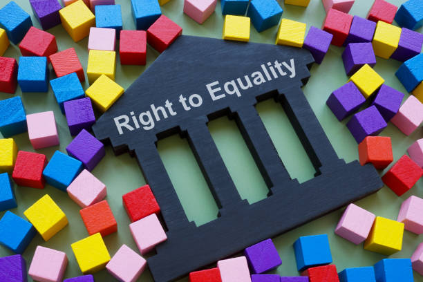 Colorful wooden cubes and Right to equality sign.