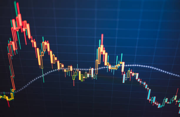 istock Businessperson or trader interactive financial graphs on Tablet 2160537643