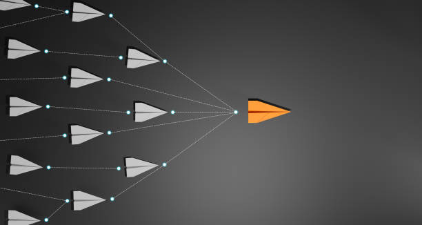 istock Leadership concept, Orage leader plane leading white plane, on dark background. 2160538406
