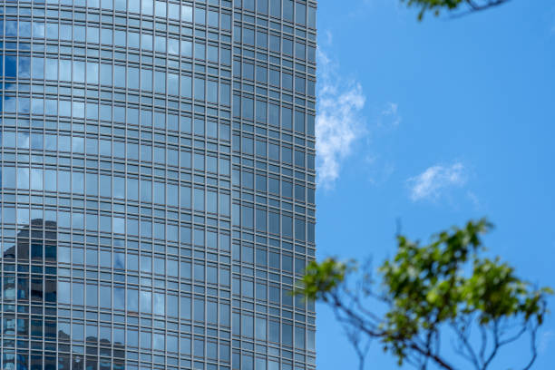 istock modern office building in hong kong; closeup 2160540054