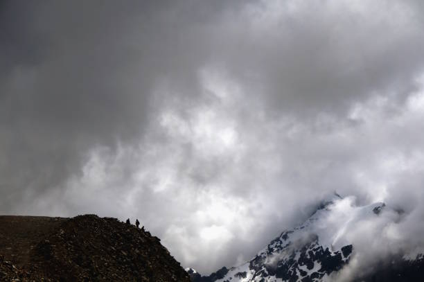 Beautiful view of the Caucasus mountains with people. Dombai. The natural landscape.