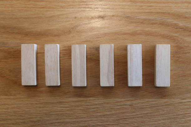 istock Six wooden puzzles arranged in a row. 2160545066