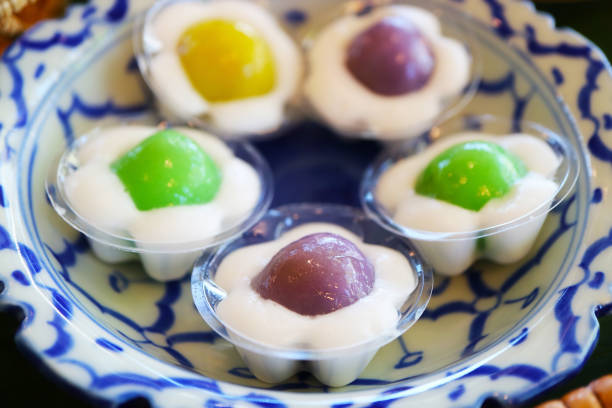 Delectable Inside-out Versioned Khanom Tom, Thai Traditional Stuffed Sweetened Coconut Ball Dumplings