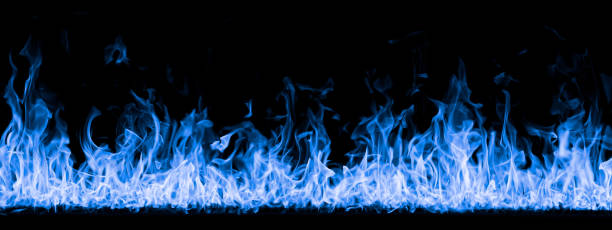 istock Fire flames. Hellflame, devil's mouth. fire banner. A background of scalding blue flames. Firestorm. Fire burning. Bright burning flames on a black background 2160551857