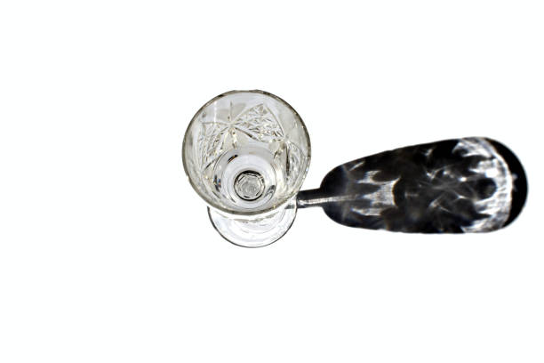 istock On a white background there is a glass and its shadow. 2160553641