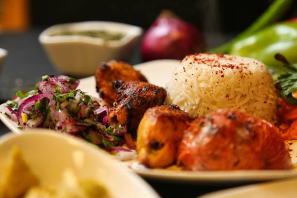 istock Grilled Chicken Skewers With Rice and Salad 2160554268