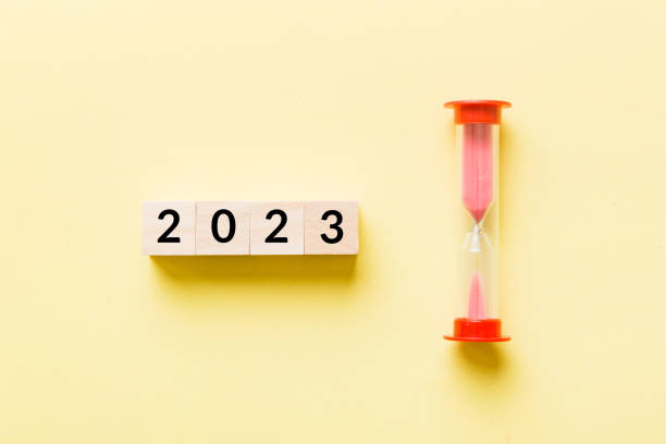 istock New Year 2023 sand timer. Resolution, time, plan, goal, motivation, reboot, countdown and New Year holiday concepts. Hourglass with number 2023 2160558126