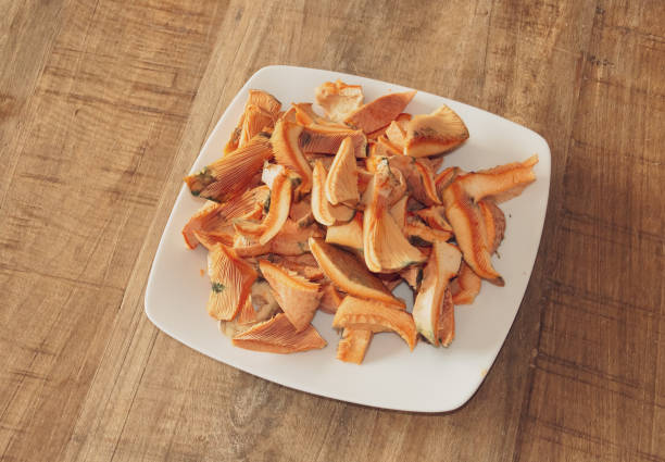 istock Dish of fresh and washed chopped mushrooms. 2160558834