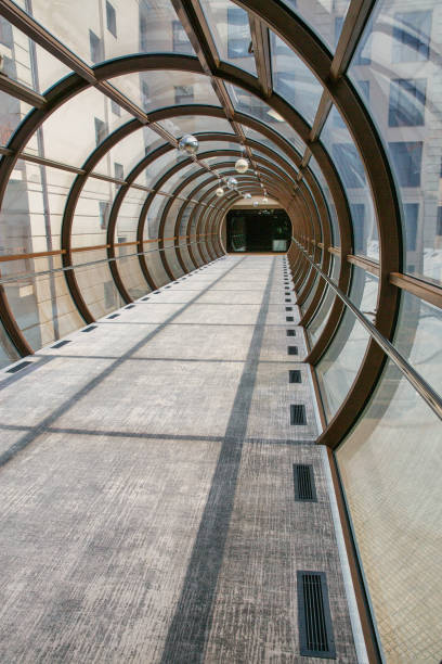 istock Foofbridge tunel made from piles and glass with abstract design. 2160563282